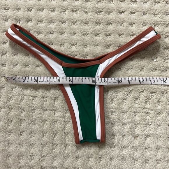 Bikini no tags. I’m a 34b and it’s small. Brazilian bottoms. - Picture 3 of 6